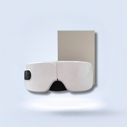 White eye mask with packaging on a light blue background, featuring text 'Soothe Your Mind. Relax Your Eyes. Sleep Deeper.'